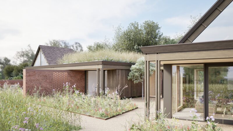 External visualisation of Clayfold house, a HO11 (e) permitted new dwelling, showing timber framing details, roof overhangs, flat green roofs and landscape planting.