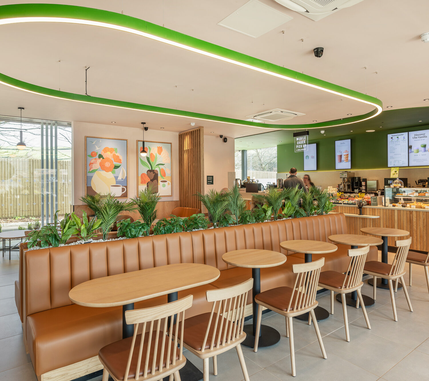 Starbucks cafe and drive through in commercial development, South Devon. Interior photograph of cafe.